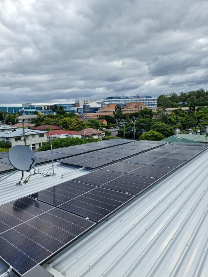 Aerial view of a large-scale rooftop solar installation