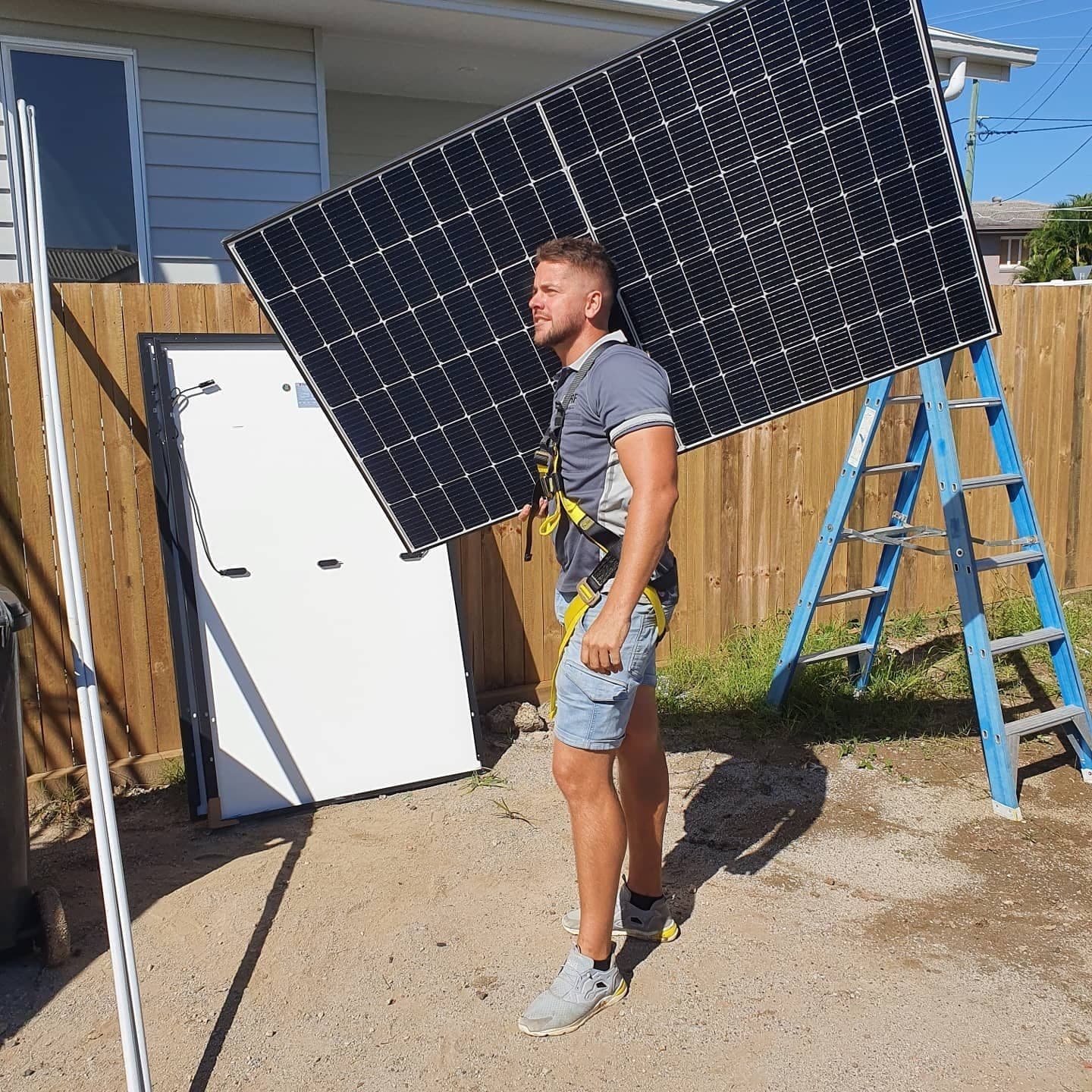 MRF Electrical technician installing a rooftop solar panel